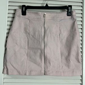 Pink zip up skirt.